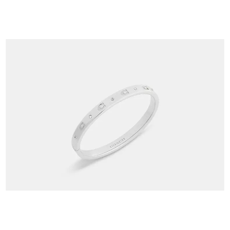 Bracelet jonc Coach – bijou élégant avec motif C